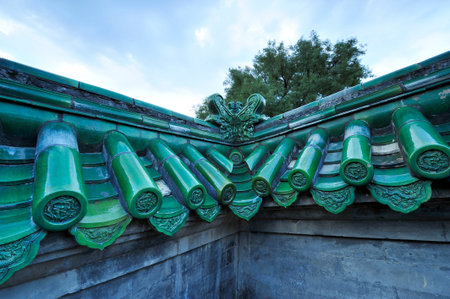 The ancient wall, blue glazed tile roof, located in the temple of heaven in Beijing, in Chinaのeditorial素材