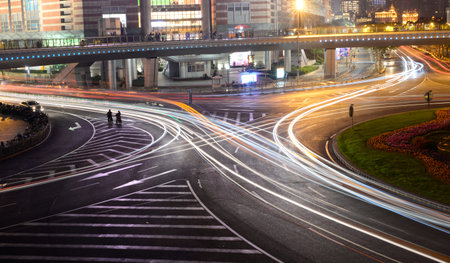 Light trails on the background of the modern architecture in Shanghai, China