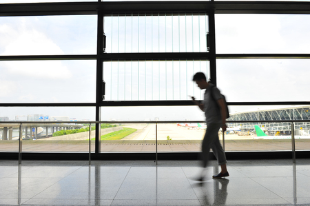 Passengers in Shanghai Pudong International Airport Airportのeditorial素材