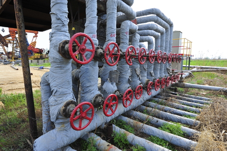 The pipe and valve oil fieldsのeditorial素材