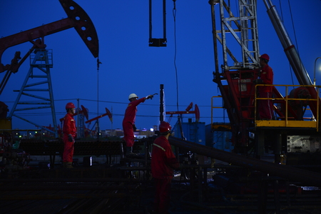 field oil workers at workのeditorial素材