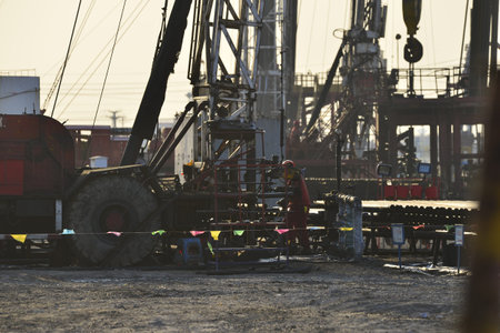 field oil workers at work