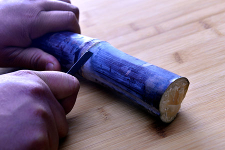 Sugarcane isolated in wooden backgroundの写真素材