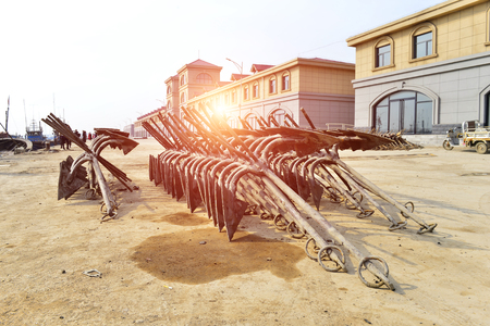 The anchor on the shoreの写真素材