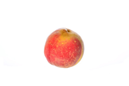 Peach isolated on a white backgroundの写真素材
