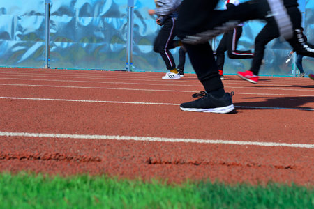 The number of athletes and the track on the runway