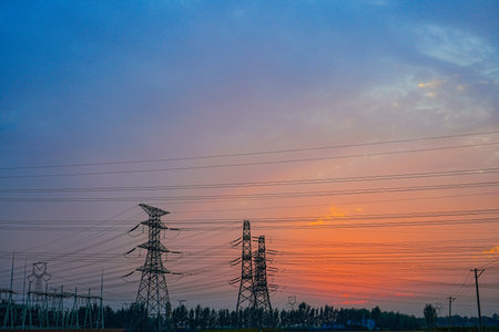 The power supply facilities in the evening the outline of the passage of timeの写真素材