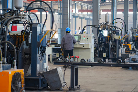 Steel mill workers command their work during operations