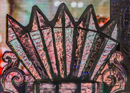 An ice decorative multi colored lamp can be used for the New Year and Christmas holidays in the winter holiday evening outsideの写真素材