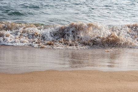 A beautiful turquoise sea with sunlight and the waves
