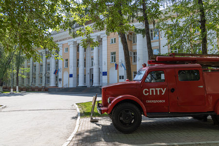 The old russian fire engine and the Ural Institute of the State Fire Service of the Ministry of...