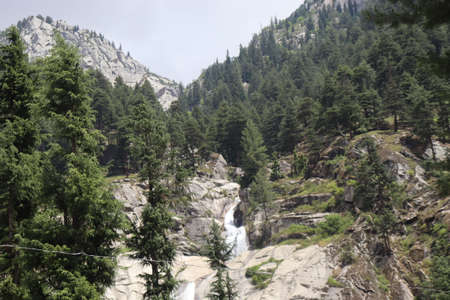 A waterfall is a river or other body of water's steep fall over a rocky ledge into a plunge pool.の写真素材