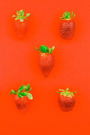 Strawberry on a red background
