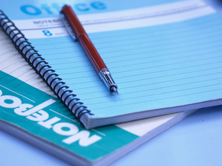 a pen on the book