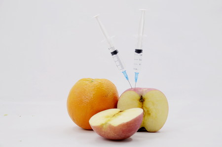 fruits with syringeの写真素材