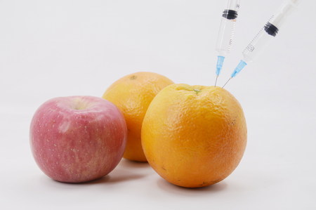 fruits with syringeの写真素材