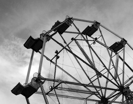 A ferris wheel in a fair ground. の写真素材