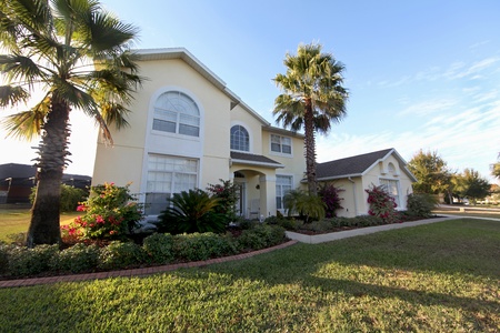A Front Exterior of a Large Florida Home A Front Exterior of a Large Florida Home