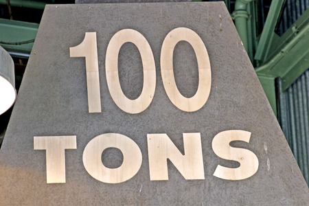 A large weight which says 100 tonsの写真素材
