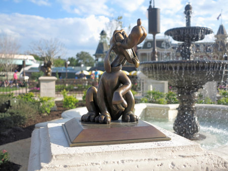 ORLANDO, FLORIDA - March 5, 2015 - The Pluto statue in its new location in the new hub of Magic Kingdom, Walt Disney Worldのeditorial素材