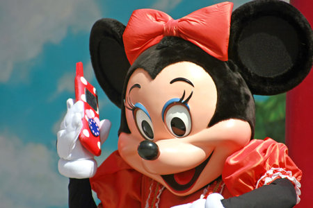 MARNE-LA-VALLEE, FRANCE - August 25, 2006 - Minnie Mouse on the phone in Walt Disney Studios Park,...