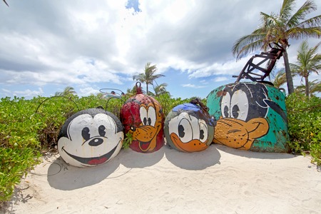CASTAWAY CAY, THE BAHAMAS - September 19, 2011 - Mount Rustmore featuring Mickey, Pluto, Donald and Goofy, on Castaway Cay, Disney Cruise private island.のeditorial素材