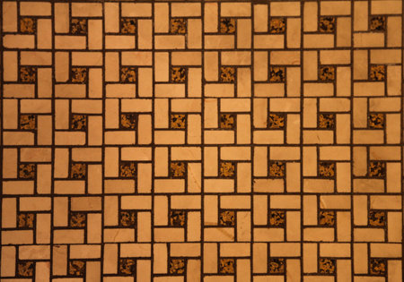 A tiled floor with squares and rectangles
