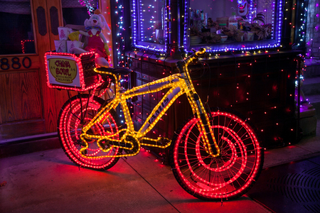 ORLANDO, FLORIDA - December 29th, 2013 - A bike with lights at the Osborne Family Spectacle of Dancing Lights at Disney's Hollywood Studios, Walt Disney World.のeditorial素材