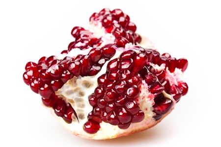 cut pomegranate isolated on white backgroundの写真素材
