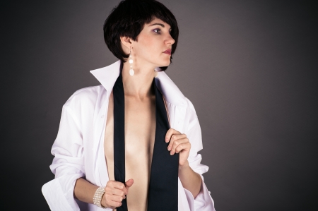 attractive woman isolated on gray backgroundの写真素材