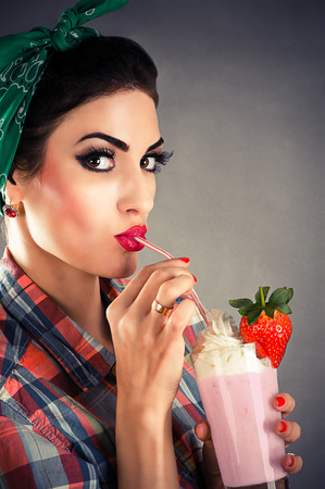 portrait of beautiful fashionable woman in retro styleの写真素材