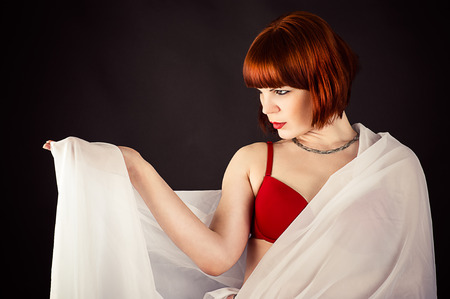 beautiful woman transparent fabric isolatedの写真素材