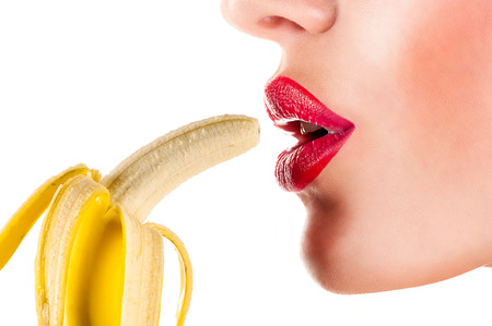 sexy woman eating bananaの写真素材