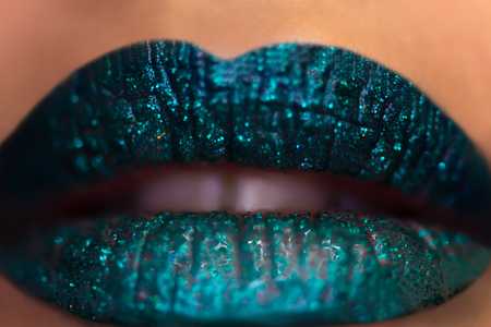 beautiful sensual lips with turquoise makeup closeupの写真素材