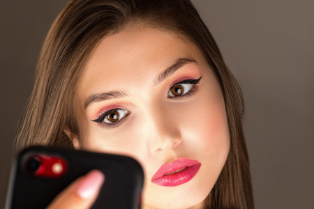 beautiful woman takes a selfie