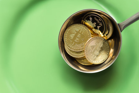 bitcoins on ladle closeup