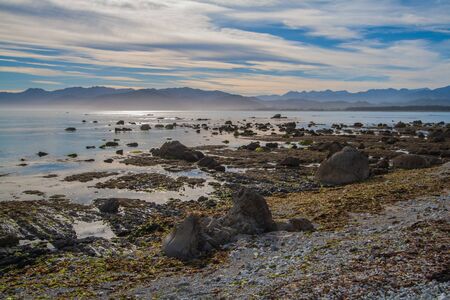 Coastline taken during a bright sunny evening の写真素材