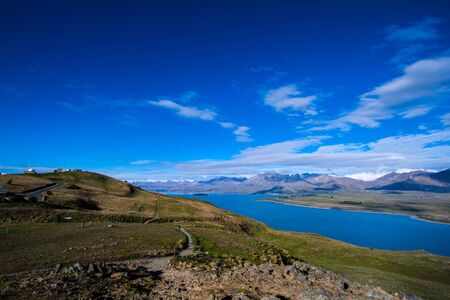 Top of mountain overlooking  lake の写真素材