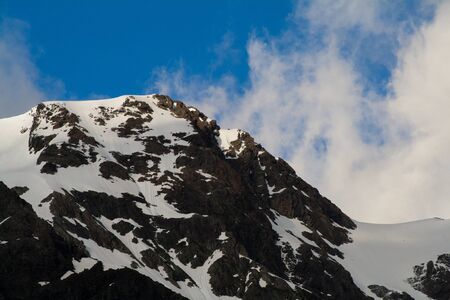 Close up of a mountain peak on a sunny dayの写真素材