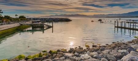 Jetty at a rocky coast の写真素材