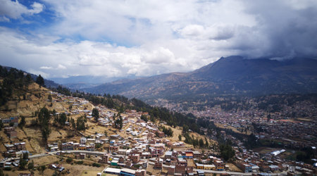 Aerial view on mountanious city of Huaraz close to Huarascan National Park in Peru. Houses on slopes...