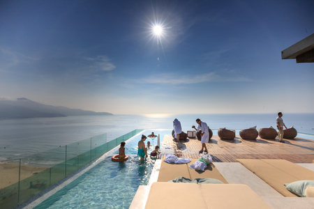 Da Nang Vietnam April 28.2015: the rooftop pool at a tourist hotel in Danang Vietnam looking the sea is a Popular tourist destination of Southeast Asia on the coastのeditorial素材