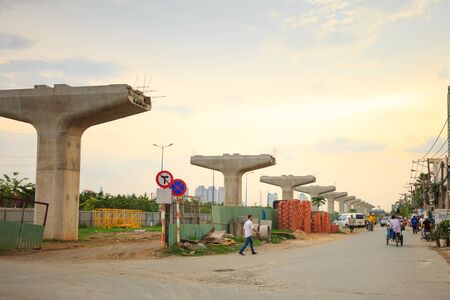 Ho Chi Minh City Vietnam June 5 2014: beton pier giant newly built subway lines cross the street for Saigon Riverのeditorial素材