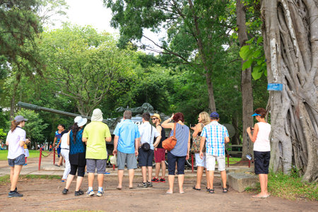 Hochiminh City, Vietnam - July 8, 2015: Tourists are watching the first tanks burst through the gates of the Independence Palace at the end of Vietnam War April 30th, 1975 at Ho Chi Minh City, Vietnam. After April 30, 1975 is known as Reunification Palaceのeditorial素材