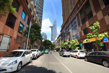 Hochiminh City, Vietnam - June 7, 2015: a street in downtown HCM overlooking the Bitexco tower, at an altitude Financial Tower stands 262.5 meters of it is the second tallest building in the world 124のeditorial素材