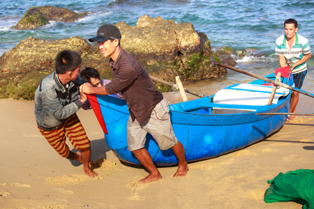 Lagi beach, Vietnam - August 16, 2015: the daily work of ngi fishing village Lagi, BinhThuan province, Vietnamのeditorial素材