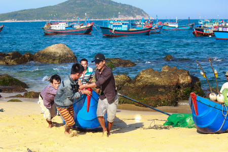 Lagi beach, Vietnam - August 16, 2015: the daily work of ngi fishing village Lagi, BinhThuan province, Vietnamのeditorial素材