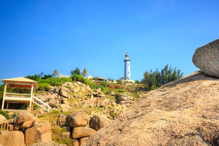 Phu Yen Province, Vietnam - August 15, 2015: Old lighthouse built by the French printer 1890. It is still operating at DaiLanh Cape, Phuyen Province, Vietnamのeditorial素材