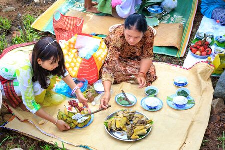 Phan Rang city, Vietnam - October 12, 2015: scene of the delicious dishes to prepare to ask for ask for their restless at ancient gods offer Poklong Girai tower. They are here in the Annual Kate festival, The Most Important m Ceremony of Cham Brahmanmoのeditorial素材