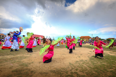 Phan Rang city, Vietnam - October 12, 2015: Dance performance at stadium print Kate festival, group of Vietnamese woman wear clothing tradition with colorful print dance fans, Phan Rang city, Ninh Thuan province, Vietnamのeditorial素材